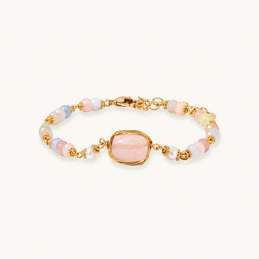 Delicate beaded bracelet with pastel rose quartz, pearls, and pink cushion-cut centerpiece in gold-plated setting