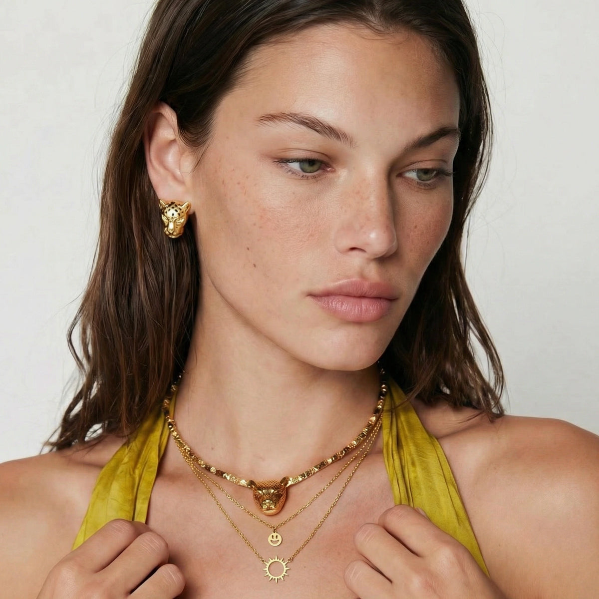 Collier superposé motif soleil et smiley